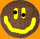 A picture of a ginger biscuit with a smiley face on it